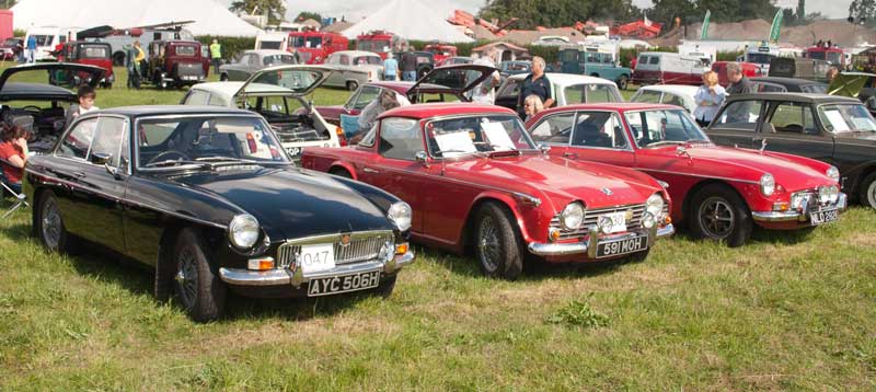 2 MGB GT and a TR5 