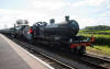 88 and 34067 taking water at Bishops Lydeard 